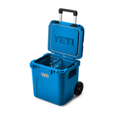 YETI Roadie 48 Wheeled Cooler in Big Wave Blue.